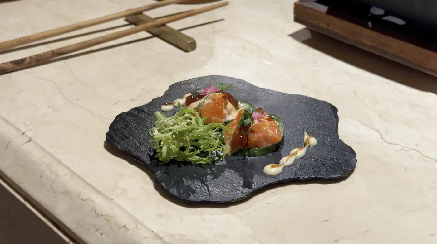 A small starter on a black slate plate