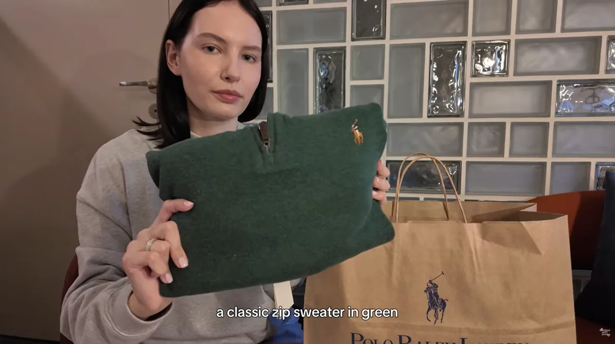 Me showing a green Polo Ralph Lauren sweater with a short neck zip and embroidered rider.